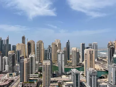 a view of a large city with tall buildings at 180° Sheik Zayed Road balcony views 2BR in JLT in Dubai
