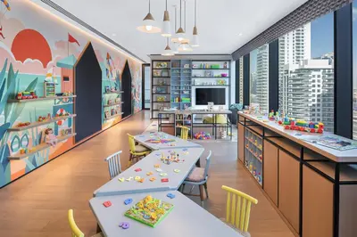 a childrens play area with tables and chairs at Vida Dubai Marina & Yacht Club in Dubai