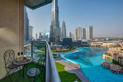 a balcony with a view of a city at Durrani Homes - Luxe Living with Burj Khalifa and Fountain View - third room without partition in Dubai