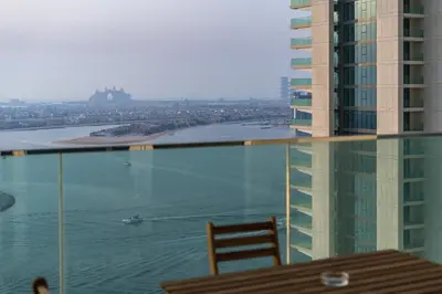 a boat in the water on a river in a building at Breathtaking Atlantis view, Spacious 2BR on beach in Dubai