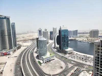 an aerial view of a city with buildings and roads at RH- Modern Elegance 2BR, prime location, Walk to Dubai Mall in Dubai