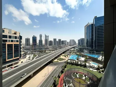 a highway in a city with a city at Trophy - Downtown Scape Views Suite in Dubai