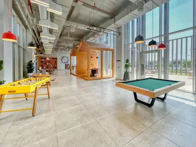 a large room with a pool table in it at GuestReady - Breath of Fresh Air in Dubai Hills in Dubai