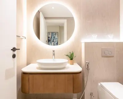 a bathroom with a sink and a mirror at Fabulous 1 bedroom apartment at 5 Star Resort in Dubai
