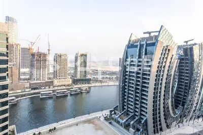 a view of a river in a city with tall buildings at Staycae Holiday Homes - Reva in Dubai