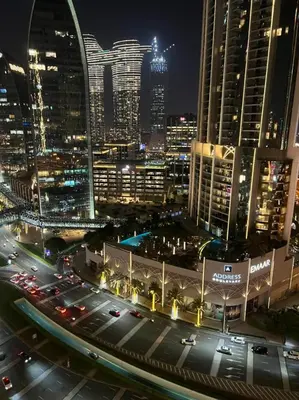 a view of a city at night with traffic at Address Dubai Mall Fashion Avenue Full Burj Khalifa views Studio in Dubai