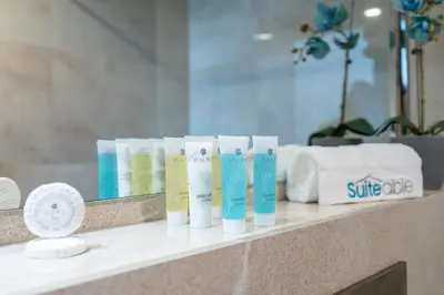 a row of toothbrushes on a counter in a bathroom at Elegant 1br in Zaya Hameni in Dubai