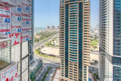 an aerial view of a city with tall buildings at Bright 1BR at Sulafa Tower Dubai Marina by Deluxe Holiday Homes in Dubai