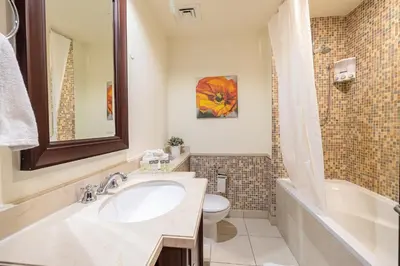 a bathroom with a sink and a toilet at 1 Bedroom at Yansoon 4, Downtown Old Town with Garden View in Dubai