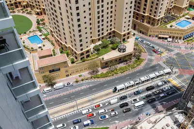 an aerial view of a busy city street with traffic at Amazing Marina View - Near the Beach! in Dubai