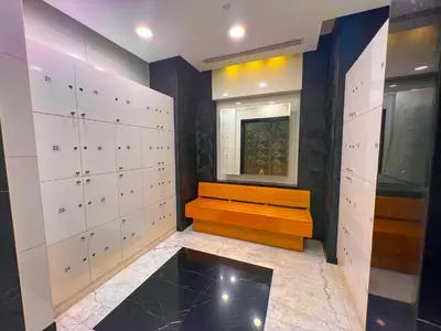 a dressing room with a bench and a window at Exquisite, luxe 1BD Apartment, Unparalleled Sea Views, Prime Dubai Marina Location & Full Kitchen by 