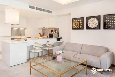 a living room with a couch and a table at Deluxe Stay - Address Dubai Mall -The Residence in Dubai