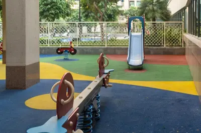 a playground with several different types of playground equipment at BellaVista 29 Boulevard 1 Bedroom Apartment with Extra Bedroom Partial Fountain Views in Dubai