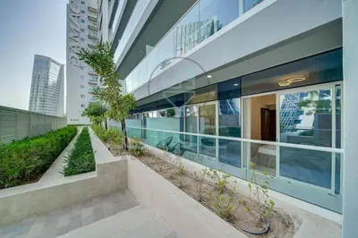 a building with a walkway in front of it at Modern City Retreat Vera Residence, Business Bay in Dubai