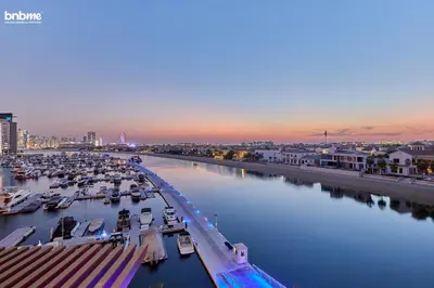 a marina filled with lots of boats in the water at bnbme - Palm Jumeirah Studio Balcony Sea Ain Dubai Views Pool Gym Parking Access in Dubai