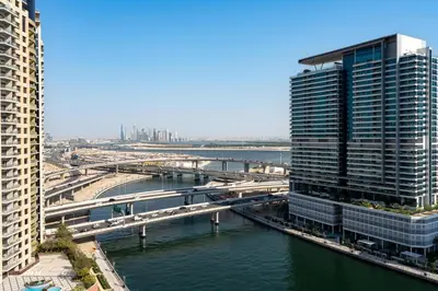 a view of a city with a river and buildings at GuestReady - Stylish Galore near Dubai Fountain in Dubai