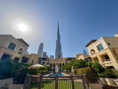 a view of the burj khalifa from the courtyard of a building at Durrani Homes - Souk Al Bahar Living Besides Burj khalifa & Fountain in Dubai