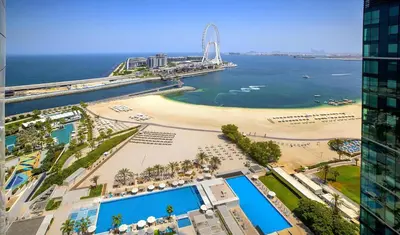 an aerial view of a beach and the ocean at Al Bateen · Ultra Luxury JBR · Private Beach and Pool in Dubai