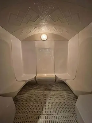 a bathroom with a toilet with a light in it at DA86 - Well Design Studio in Dubai Arch tower in Dubai
