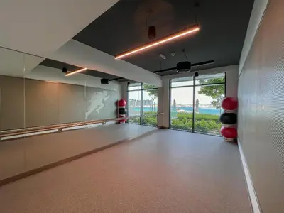 a large room with a large glass door and a large window at Beachfront 2BR with Spectacular Sea and Palm Views - 17AB06 in Dubai