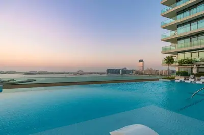a large swimming pool on top of a building at prime retreats - beach vista Emaar in Dubai
