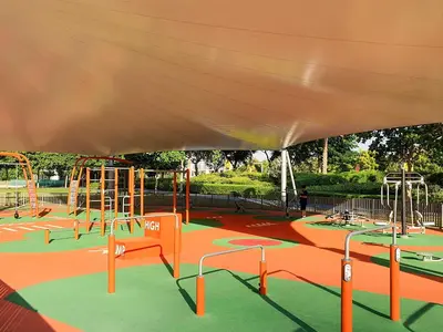 a park with a playground with slides and swings at Luxury Apt - Rooftop Pool - City View in Dubai