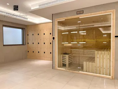 a room with a large glass door in a room at Mira Holiday Homes - Lovely 1 bedroom in Downtown in Dubai