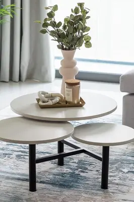 two coffee tables with a vase on top of them at Frank Porter - Beach Vista Tower 2 in Dubai