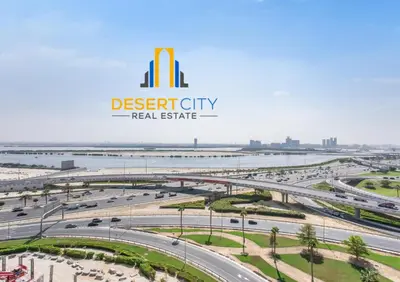 a rendering of the desert city real estate logo at 2 Bed in Azzizi Farhad with Burj Khalifa view by Desert City Stays in Dubai