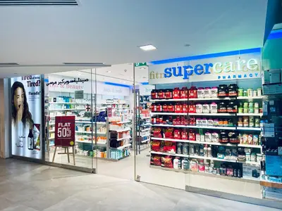 a store with a display case in a store at Vacay Lettings - Silverene Marina Retreat - Waterfront Apartment Steps from Marina Mall in Dubai