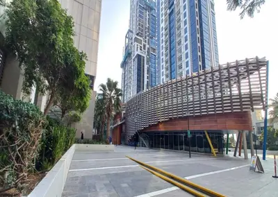 a large building in a city with tall buildings at Luxury 1BR Apartment Executive Towers Business Bay in Dubai