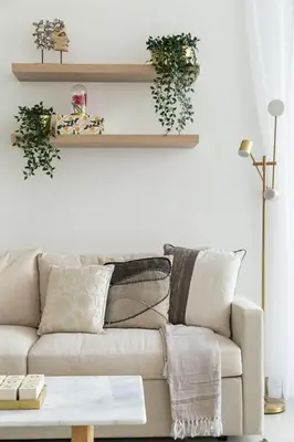 a living room with a couch and a table at Frank Porter - Pulse C2 in Dubai