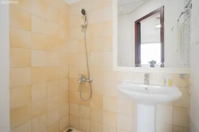 a bathroom with a shower and a sink at JBR - Apartment plus maid in Dubai