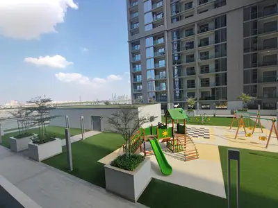 a playground with a slide in a city at Modern 1 bedroom - Close to Business Bay - Sobha Creek Vista in Dubai
