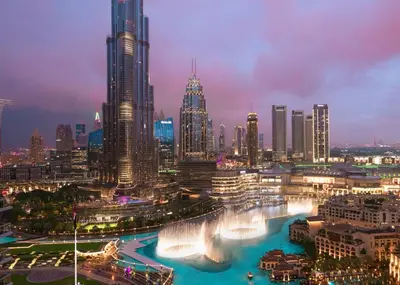 a view of a city at night with a fountain at Elite Royal Apartment - Full Burj Khalifa & Fountain View - Majesty in Dubai