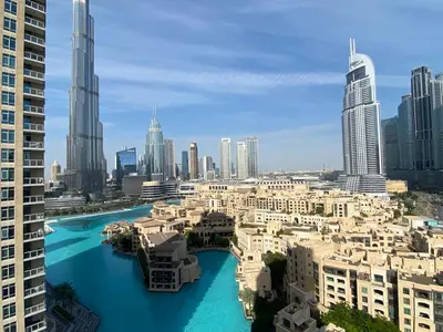 a view of a city with a river and buildings at Durrani Homes - The Residences 5BR Besides Dubai Mall with Burjkhalifa and Fountain view in Dubai