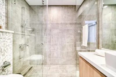 a bathroom with a shower with a sink and a toilet at Stella Maris, Dubai Marina - Mint Stay in Dubai