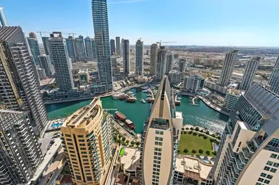 a view of a city with a river and buildings at Beautiful Sea and Marina View - Premium 2BR in JBR in Dubai