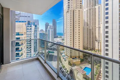 a balcony with a view of a city at Modern 1BR in Dubai Marina Near Metro & Beach in Dubai