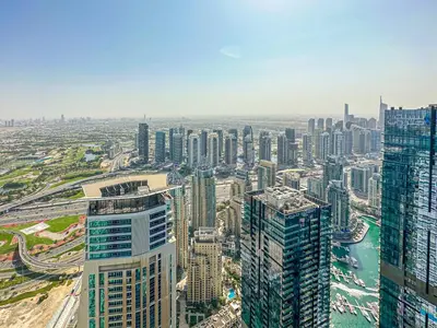 an aerial view of a city with tall buildings at HiGuests - Luxurious High-Rise Apartment With Stunning Views in Dubai