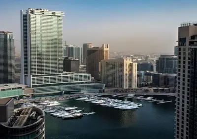 a group of boats in a harbor in a city at 360 Vacation - Spacious 3BR Close to the Beach I Rimal1 JBR in Dubai