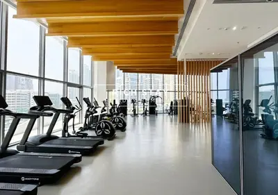a gym with treadmills and exercise equipment in a building at Unique 1BR in Stella Maris,City View,Dubai Marina in Dubai