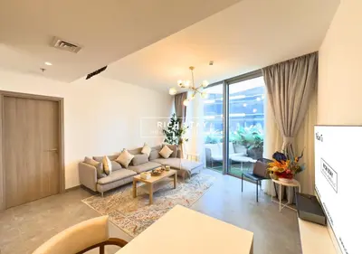 a living room with a couch and a table at Unique 1BR in Stella Maris,City View,Dubai Marina in Dubai