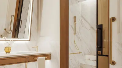 a bathroom with a sink and a mirror at Jumeirah Residences Marsa Al Arab Dubai in Dubai