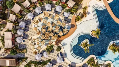 an aerial view of a resort with a pool at Jumeirah Marsa Al Arab Dubai in Dubai