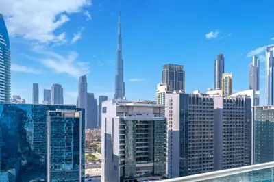 a view of a city skyline with tall buildings at Skyline 20thModern 1BRIconic Burj Khalifa View in Dubai