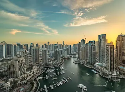 a view of a city with boats in the water at Luxurious 3BR Maid room 33rd Floor Marina Gate in Dubai