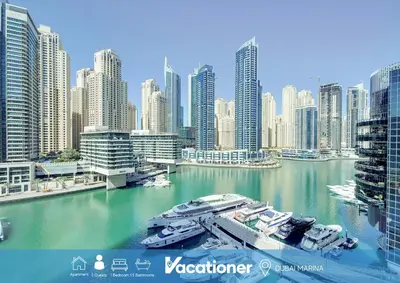 a view of a city with boats in the water at Vacationer I Elegant 1 Bedroom Apartment I Marina Views I Walk to Marina Mall I Silverene Tower B in Dubai