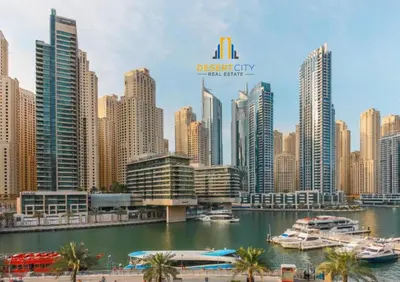 a view of a city with boats in the water at One Bed in Dubai Marina with Marina Views, Hosted by Desert City Stays in Dubai
