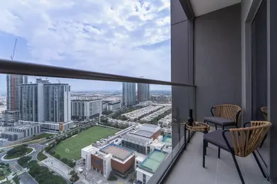 a balcony with a view of a city at Intimate Apartment with Scenic View of Dubai Creek in Dubai
